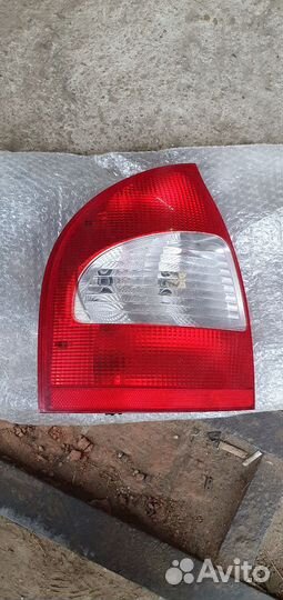 Задний левый фонарь калина седан