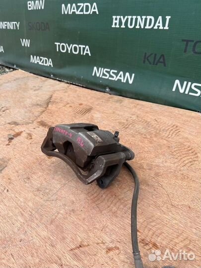 Суппорт тормозной передний левый Kia Sorento 4 4WD