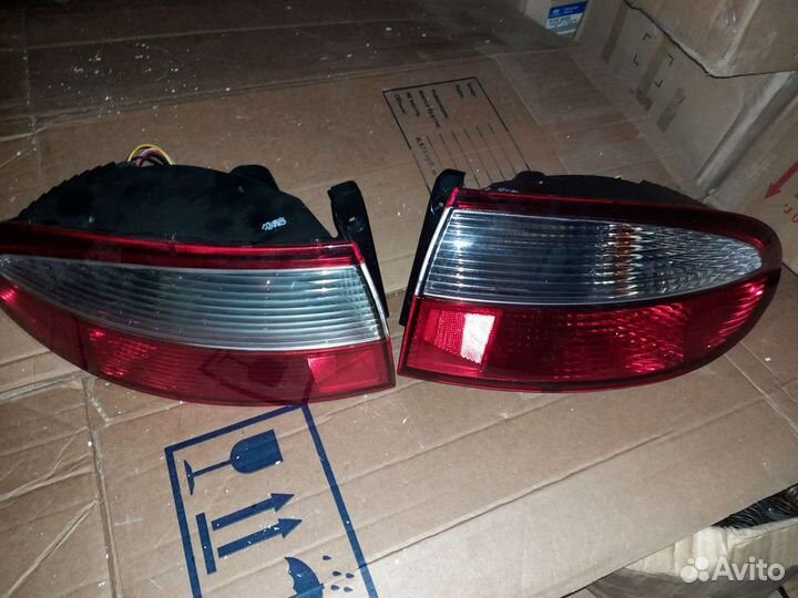 Фонарь задний наружный на chevrolet lanos (2004)