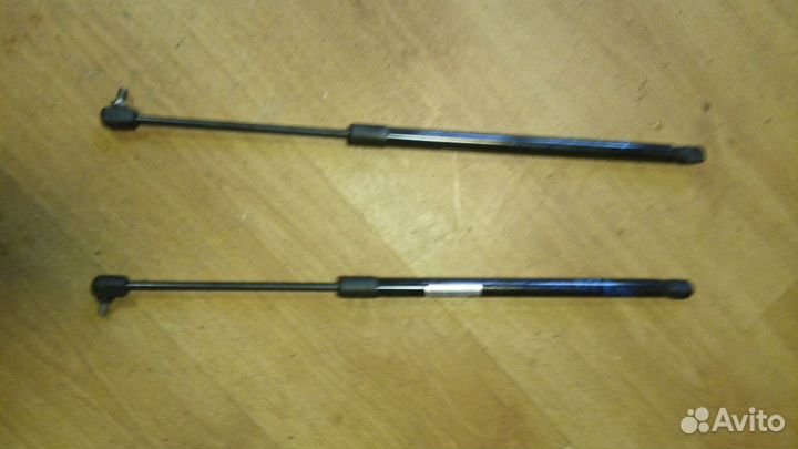 Амортизаторы крышки багажника Рено сценик 2