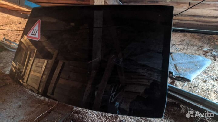 Стекло заднее renault logan