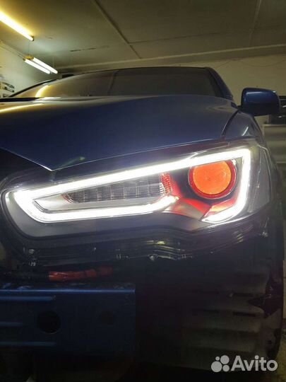 Audi style оптика для Lancer X