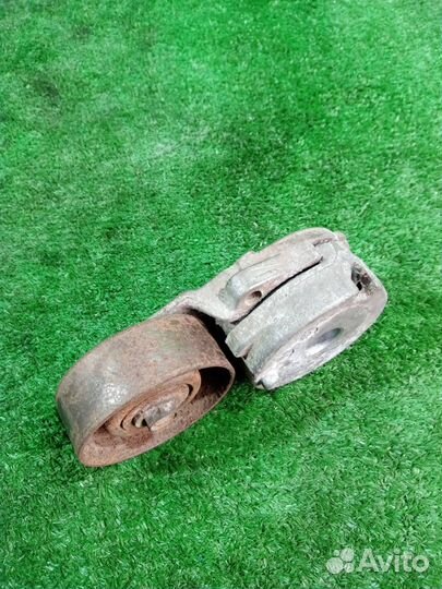 Натяжитель ремня Nissan Dualis / Qashqai KNJ10