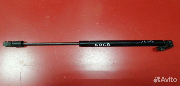 Амортизатор багажника правый Nissan Murano