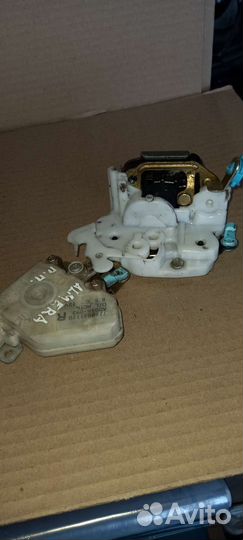 Замок двери передний правый Nissan Almera Classic