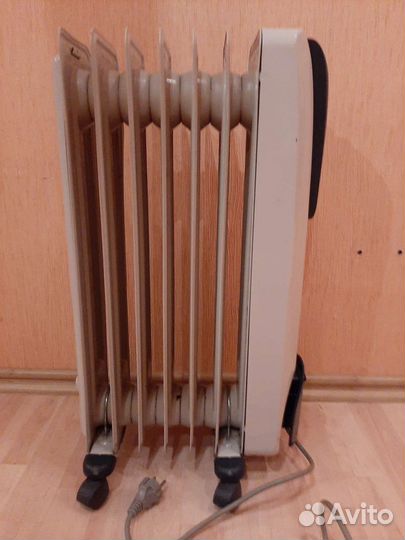 Масляный обогреватель delonghi