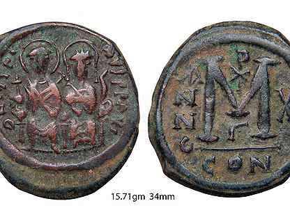 Бронзовая монета византии. Древние монеты Византии бронза. Фоллис Арабо-Византия 34 мм.