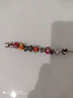 Серебряный браслет с шармами